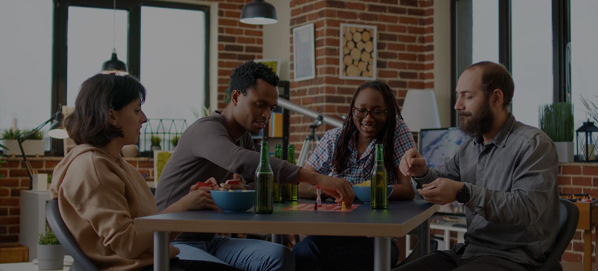 Socialising and having fun over some drinks, food and board games.